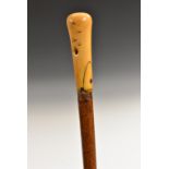 An early 18th century gentleman's ivory and malacca walking stick, of slender proportions,