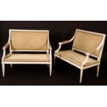 A pair of French Louis XVI design painted sofas, rectangular backs, scroll arms,