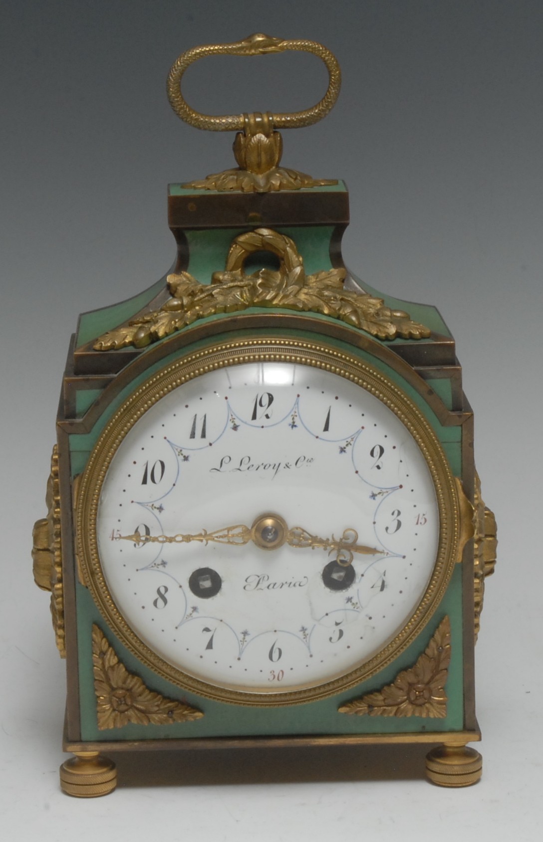 A Belle Epoque French ormolu mounted green stained horn table clock, in Louis XVI taste,