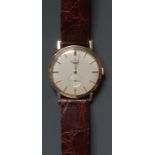 Longines - a vintage 1950s gentleman's 9ct gold cased wristwatch, textured silvered dial,