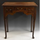 A George III mahogany lowboy, of small proportions,