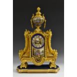 A French mid 19th century ormolu and porcelain mounted mantel clock, the 9.