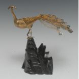 A Chinese silver-gilt model, of a Peking peacock, hardwood base, 19.