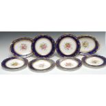 A Coalport eight piece dessert service, comprising two oval serving dishes and six plates,