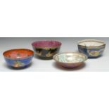 A Wedgwood Lustre bowl, the interior printed with three phoenix within a star,