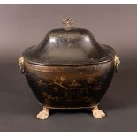 A Regency toleware sarcophagus fuel box, lion mask handles to sides, brass lion paw feet, 53cm wide,