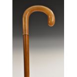 A late 19th century gentleman's gilt-metal mounted horn and malacca walking stick,