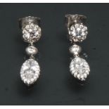 A pair of diamond navette drop earrings,