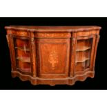 A Victorian gilt metal mounted burr walnut and marquetry shaped serpentine credenza,