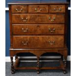 A George II walnut chest on stand,