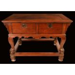 A substantial Chinese hardwood centre table, rectangular panel top above a pair of deep drawers,