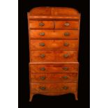 An early 19th century mahogany chest on chest, possibly Channel Islands,