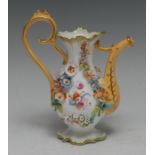 A Rockingham type novelty miniature coffee pot, encrusted with flowers, 16cm high, c.