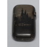 A Russian silver and niello vesta case, the front decorated with St Basil's Cathedral, 6cm high,