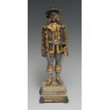 Giuseppe Vasari (Italian 20th century), a silvered and parcel-gilt bronze, of a cavalier, he stands,