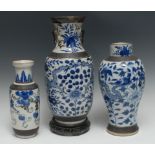 A late 19th century Chinese ovoid vase, decorated in underglaze blue, with scrolling dragon,