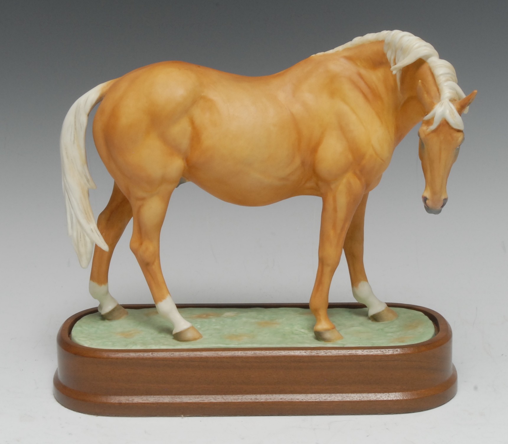 A Royal Worcester Palomino Thoroughbred Mare, model by Doris Lindner ...