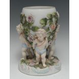 A late 19th century Continental porcelain vase, the ovoid body encrusted with roses and foliage,