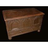 A 17th century continental oak mule chest, hinged top,