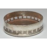 A George III silver circular wine coaster, pierced,