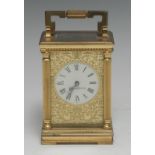 An early 20th century lacquered brass carriage timepiece, 4.