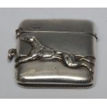 A George V silver vesta case, the front with applied with a running greyhound,