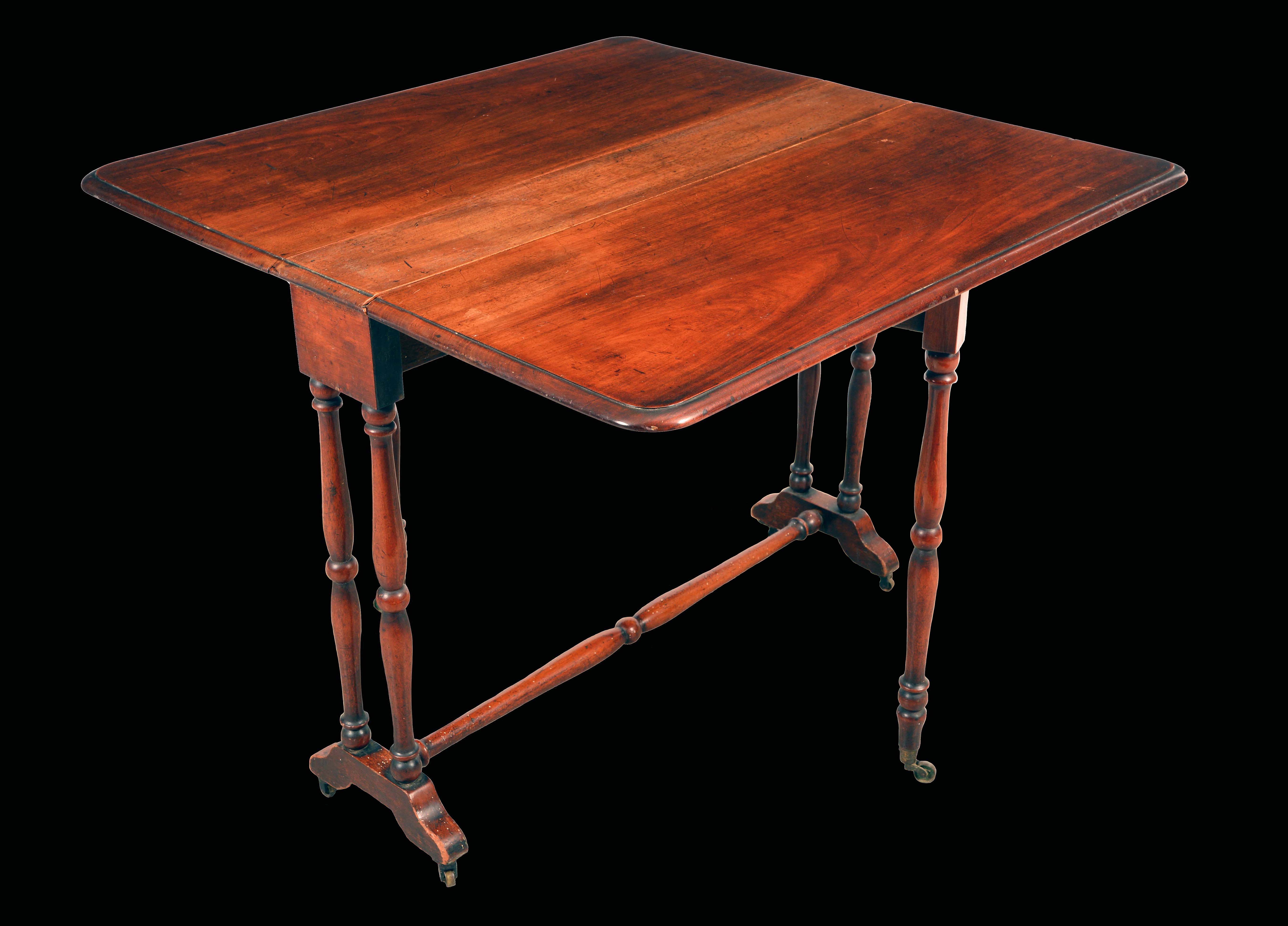 A Victorian mahogany Sutherland table, rounded rectangular top, turned supports, brass casters,