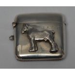 A George V silver rounded rectangular vesta case, applied with a shire horse, hinged cover,