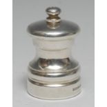 An Elizabeth II silver pepper grinder, 7cm long,