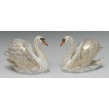 A pair of Royal Crown Derby paperweights, The Royal Swans, William and Catherine,