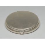 Tiffany & Co - an American silver circular compact, hinged cover enclosing a mirror, 8cm diam,