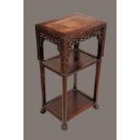 A Chinese padouk wood rectangular jardiniere stand, the top with inset soapstone panel,