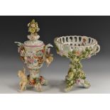 A Sitzendorf vase and cover, with cherubs, floral encrusted,