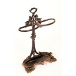 A Coalbrookdale style cast iron walking stick stand, twin divisions,