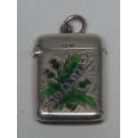 An early 20th century rounded rectangular vesta case, enamelled with thistles and Turiff, 4cm high,