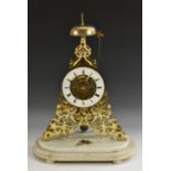 A mid 19th century brass skeleton clock, enamelled chapter ring, Roman numerals, signed White,