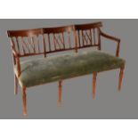 A George IV mahogany triple-chair-back sofa,