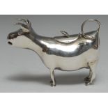 A 19th century Dutch silver cow creamer, in the manner of John Schuppe, hinged cover, 13.