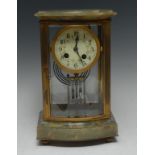 A late 19th century French onyx four-glass serpentine mantel clock,