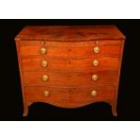 A George III mahogany serpentine bachelors chest,
