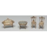 An Elizabeth II silver miniature toy drawing room suite, comprising a centre table,