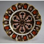 A Royal Crown Derby 1128 pattern shaped circular plate, 22cm diameter, printed marks,