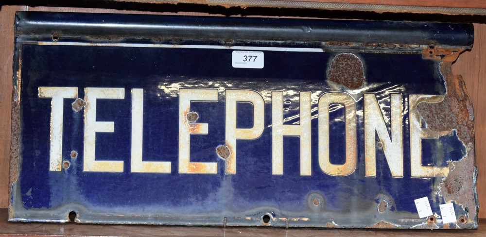A mid 20th century enamelled telephone sign