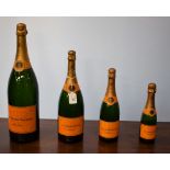 Advertising - a graduated set of four Veuve Clicquot Ponsardin champagne shop display bottles (4)