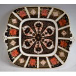 A Royal Crown Derby 1128 pattern shaped square bread and butter plate,