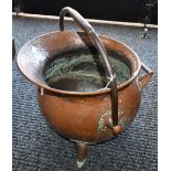 A late 19th century hammered cauldron coal scuttle, fixed handle,