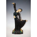 An Art Deco style resin figure, of a dancing girl, marble plinth,