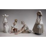 A Lladro figure, First Performance; others, Time To Sew and Rose Ballet; a Nao figure,