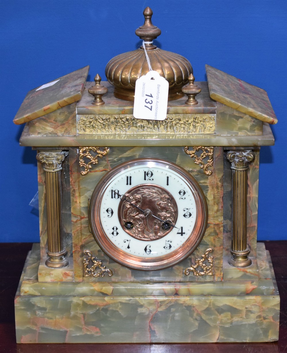 A green onyx early 20th century mantel clock, classical frieze to face, Arabic numerals,