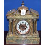 A green onyx early 20th century mantel clock, classical frieze to face, Arabic numerals,